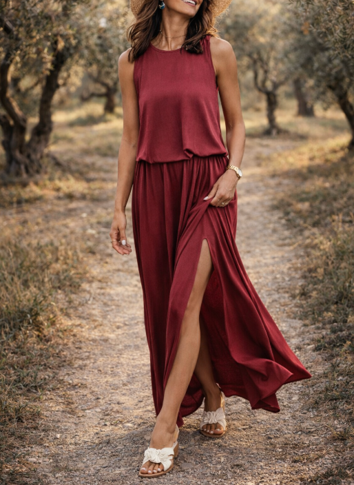 Abito lungo donna senza maniche con elegante spacco laterale, perfetto per un look estivo fluido e casual.