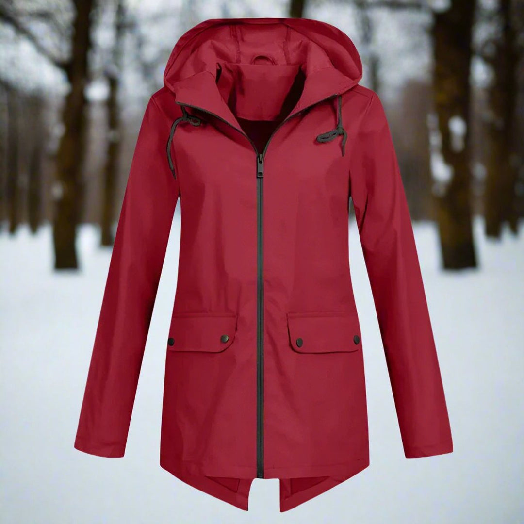 Giacca da donna trendy, con cappuccio, zip frontale e polsini, per un look dinamico.