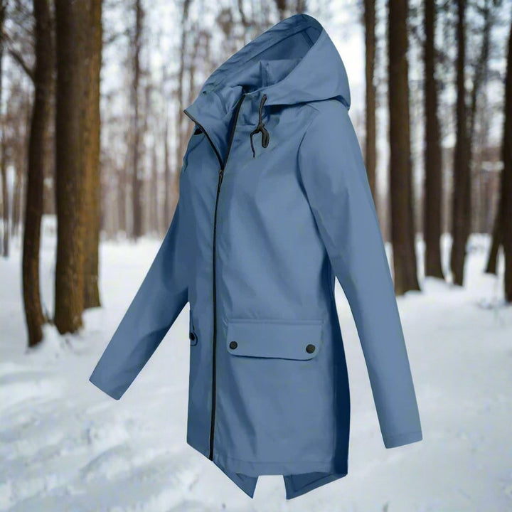 Elegante giacca casual da donna, con cappuccio e polsini regolabili per comfort.