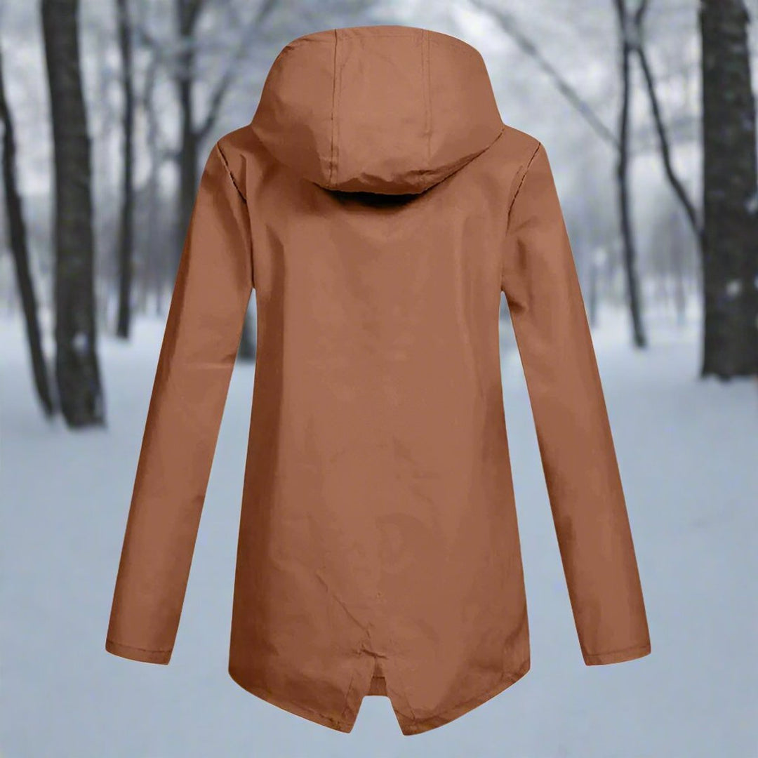Comoda giacca da donna con cappuccio, zip e polsini, perfetta per look casual autunnali.