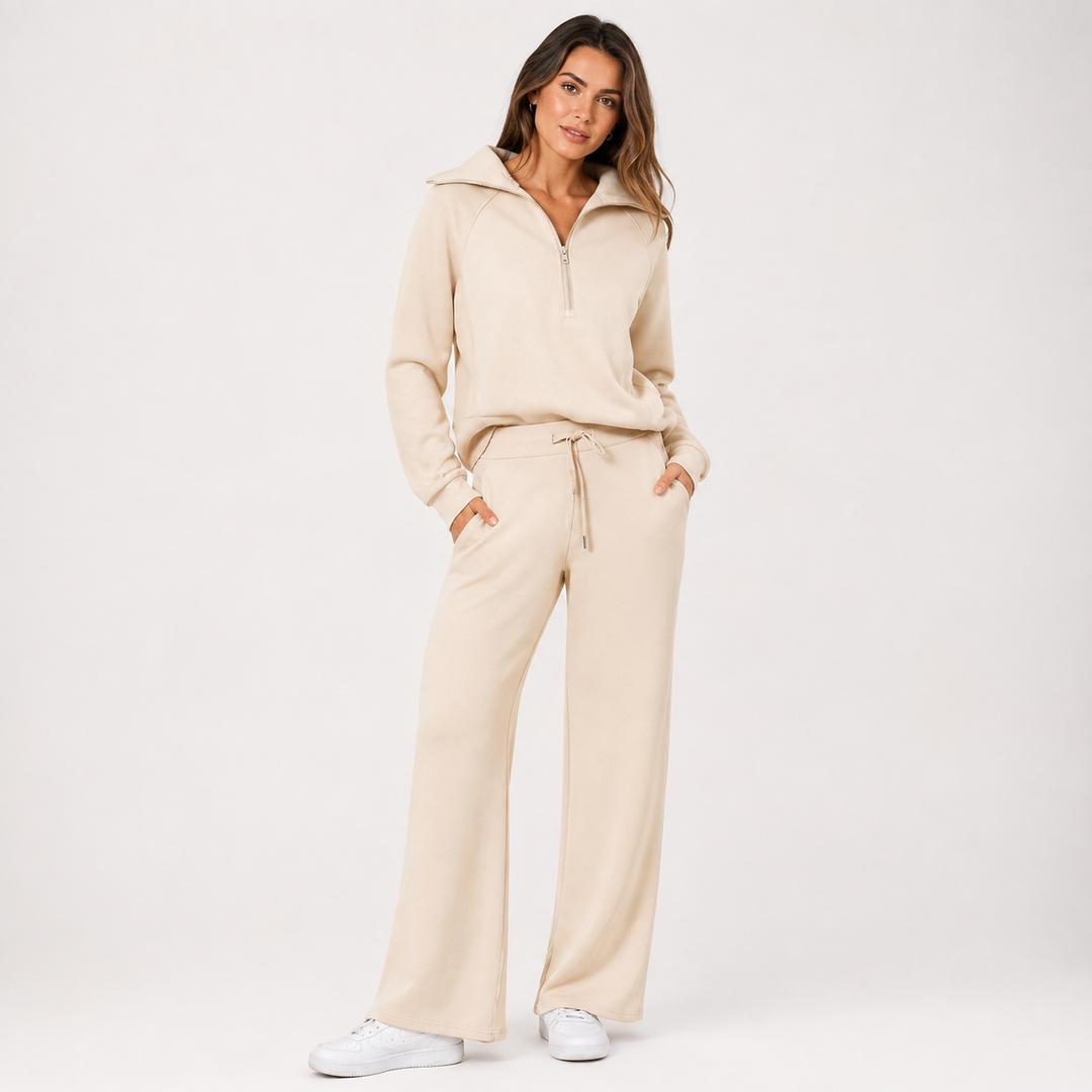 Completo loungewear donna casual, felpa con zip e pantaloni a gamba larga per il massimo comfort in casa.