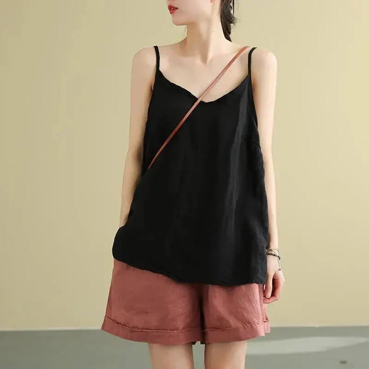 Top donna casual senza maniche, con scollo rotondo, un capo essenziale per un guardaroba versatile e alla moda.
