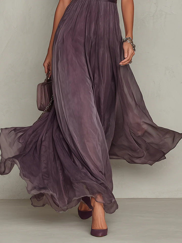 Eleganza fluida: abito maxi chiffon viola donna, stile vintage. Perfetto per cerimonie eleganti e serate di classe.