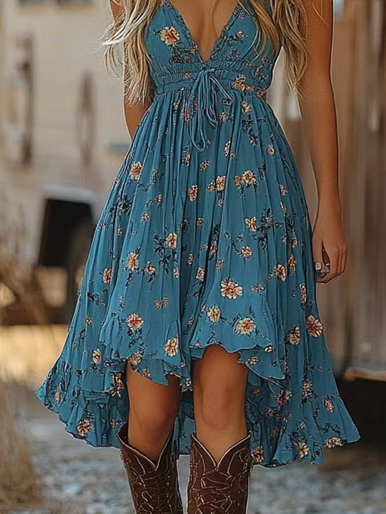 Mini abito donna blu a fantasia floreale con dettagli volant, un capo femminile e leggero per l'estate.