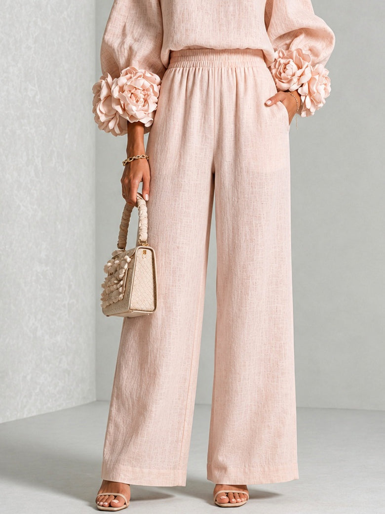 Completo donna floreale elegante con pantaloni larghi comodi e top abbinato. Abbigliamento versatile casual chic.