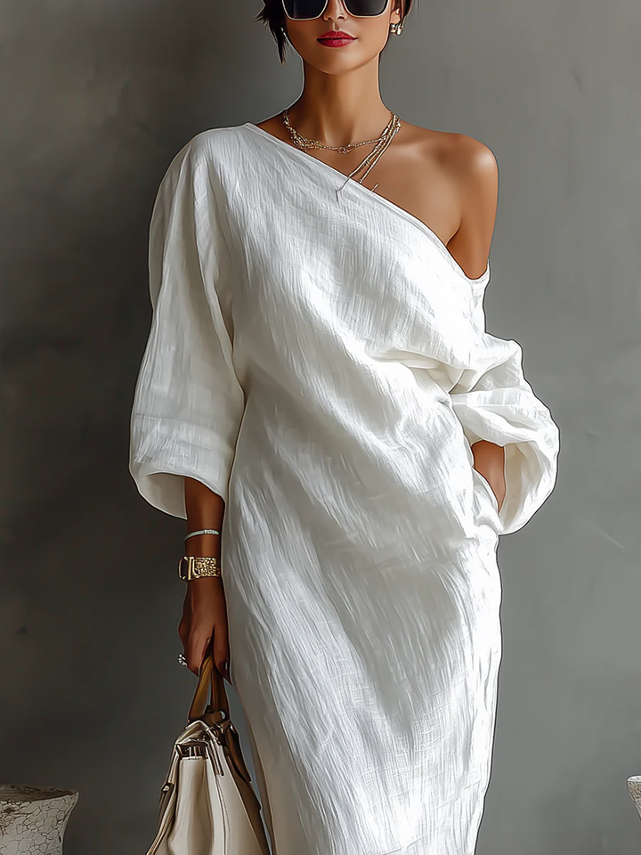 Vestito da cerimonia donna monospalla, taglio maxi fluido, per un'eleganza senza tempo.