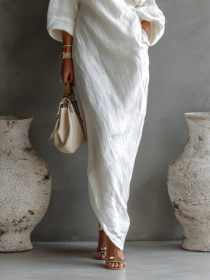 Abito donna monospalla lungo, stile fluido, perfetto per eventi estivi o look da sera.