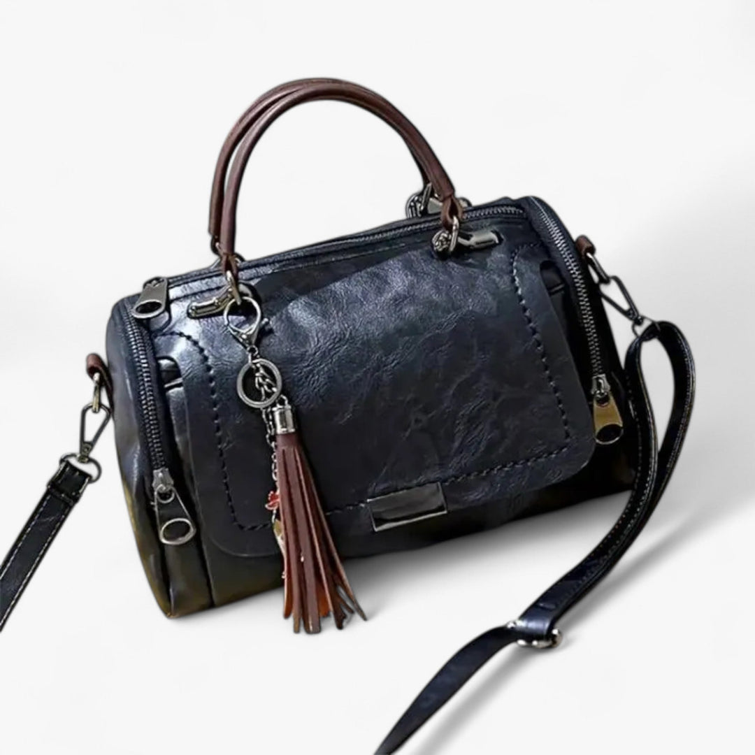 Borsa a tracolla donna elegante con vivaci frange multicolori, perfetta per outfit alla moda.