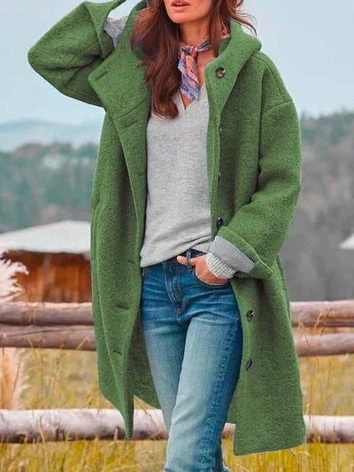 Elegante cappotto invernale da donna verde oversize, comodo e caldo, ideale per le giornate fredde.