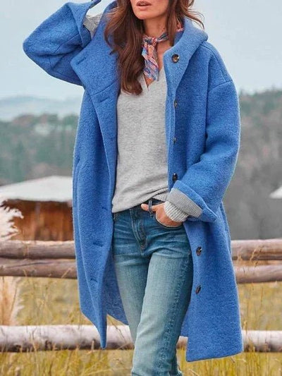 Cappotto lungo da donna blu, antivento e caldo, con taglio moderno, perfetto per l'inverno rigido.