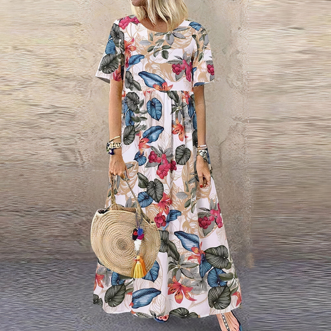Maxi abito floreale da donna, taglio rilassato, perfetto per estate e primavera. Stile casual ed elegante.