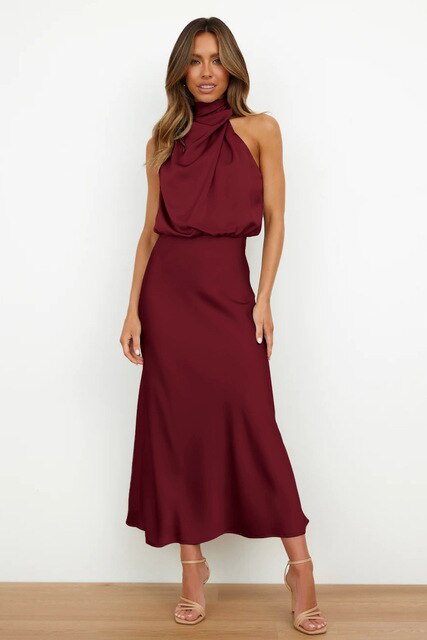 Elegante abito midi donna con cintura, stile raffinato per primavera e autunno, ideale per cene speciali.
