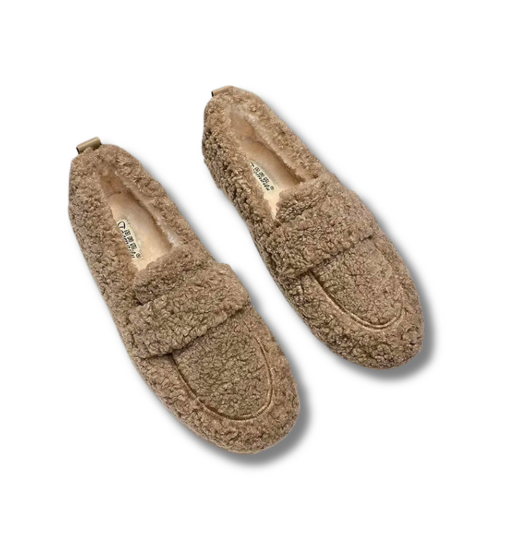 Scarpe invernali nere da donna, modello slip-on per massima comodità e calore.
