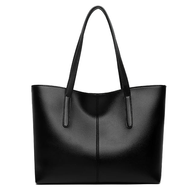 Borsa a tracolla donna in pelle vegana, elegante e versatile. Accessorio di moda etica, perfetto per ogni outfit.