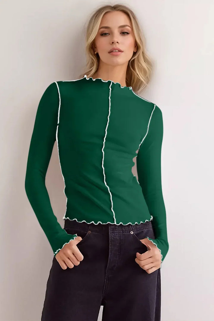 T-shirt donna con maniche lunghe e collo alto. Stile casual ed elegante. Perfetta per il comfort quotidiano.