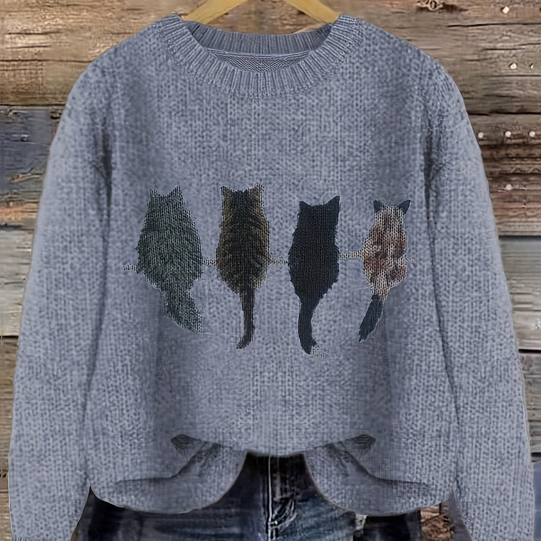 Maglione oversize donna blu con gatti, girocollo. Stile casual e comfort invernale.