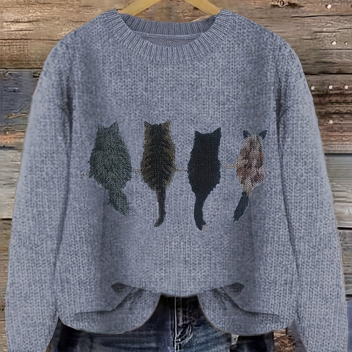 Maglione oversize donna blu con gatti, girocollo. Stile casual e comfort invernale.
