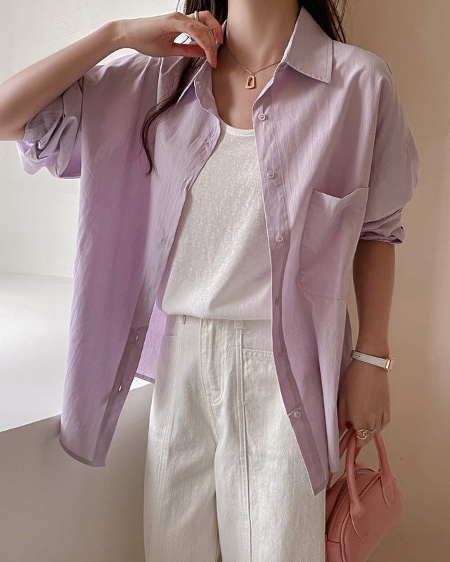 Stilosa camicia rosa cipria da donna, taglio ampio e relaxed fit, perfetta per look oversize.