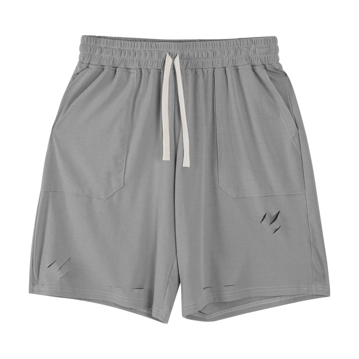 Pantaloncini sportivi uomo per il massimo comfort, con eleganti dettagli strappati per un look estivo versatile.