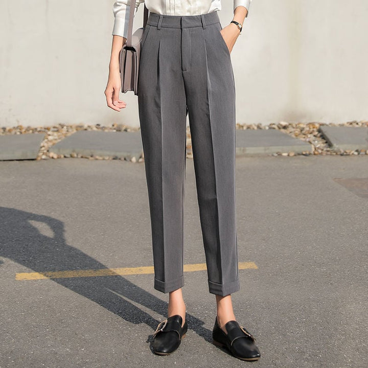 Pantaloni eleganti donna neri a vita alta, affusurati, perfetti per look casual, formali o da ufficio.