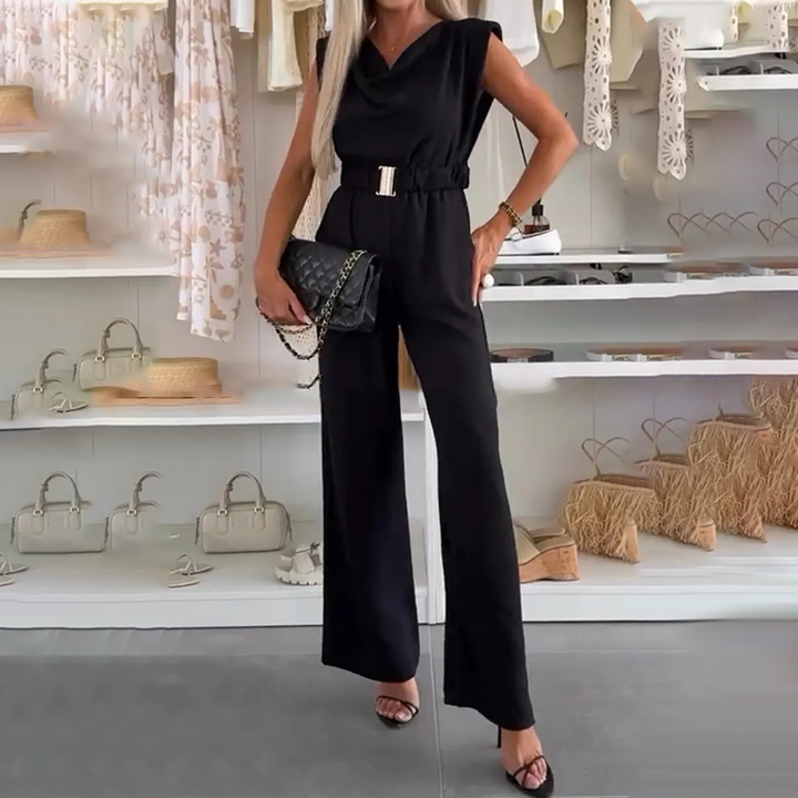 Tuta donna senza maniche, scollo drappeggiato, vita elastica e pantaloni ampi per comfort e stile chic.