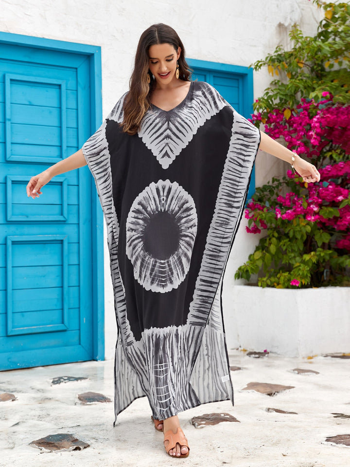 Abito lungo donna stampato, scollo a V, ideale per un outfit estivo bohémien.