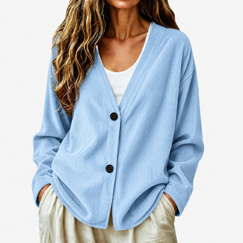 Cardigan donna con bottoni, scollo a V e texture a coste. Stile elegante e moderno.