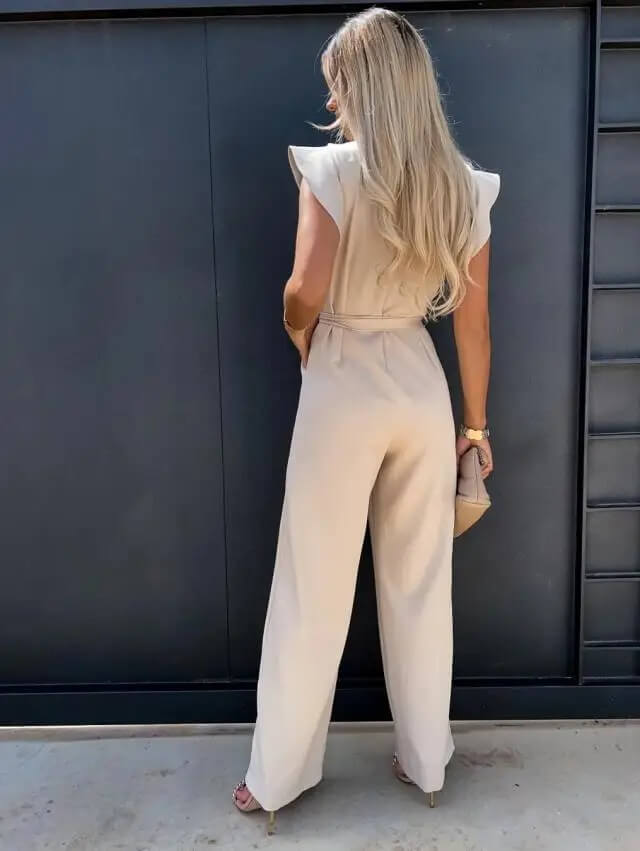 Monopezzo da donna primaverile, elegante con maniche arricciate, ideale per cerimonia o moda estiva.