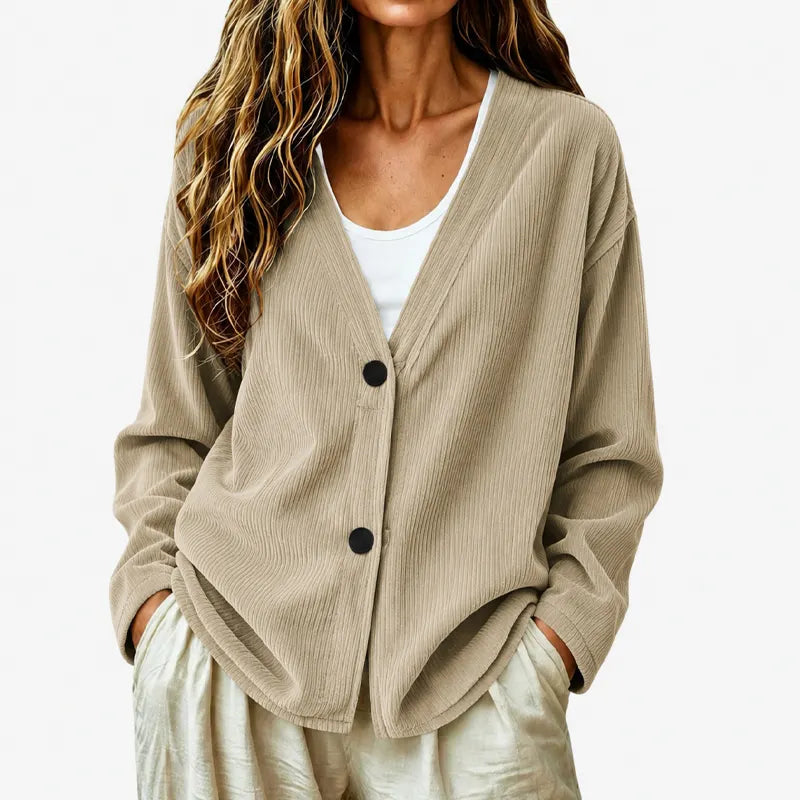Cardigan nero donna elegante a coste, con scollo a V e bottoni. Versatile per autunno.