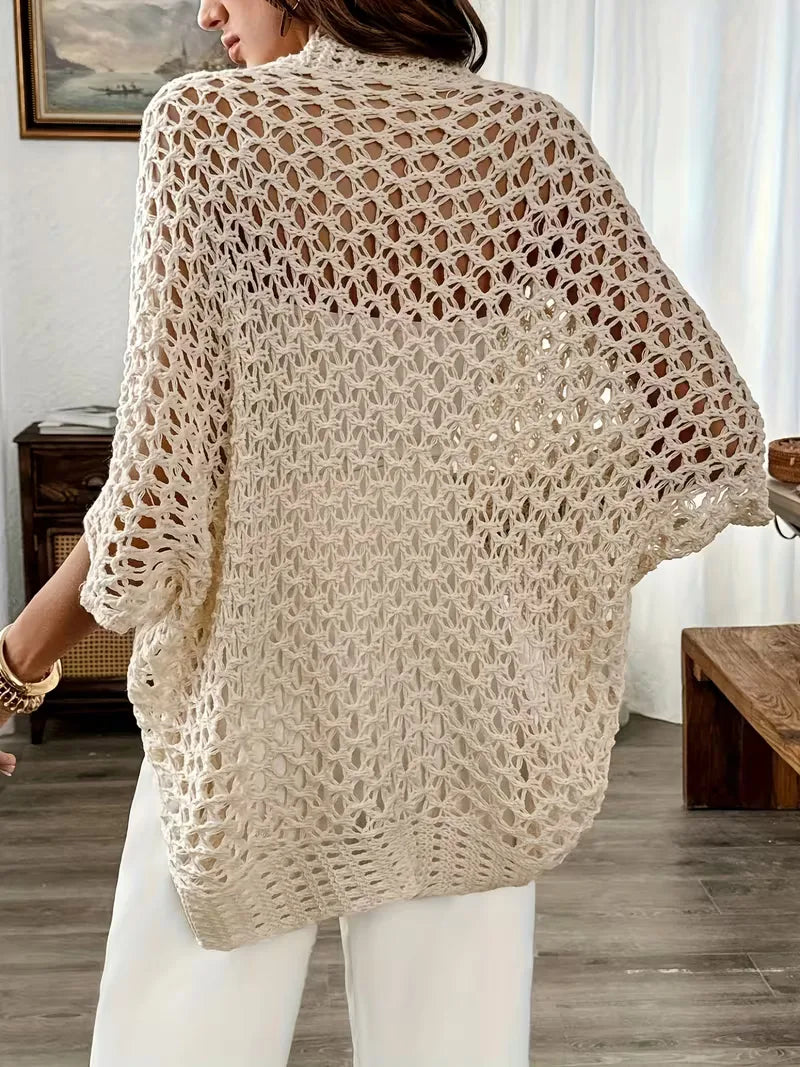 Elegante cardigan aperto beige da donna, perfetto per aggiungere un tocco di moda a strati in ogni stagione.
