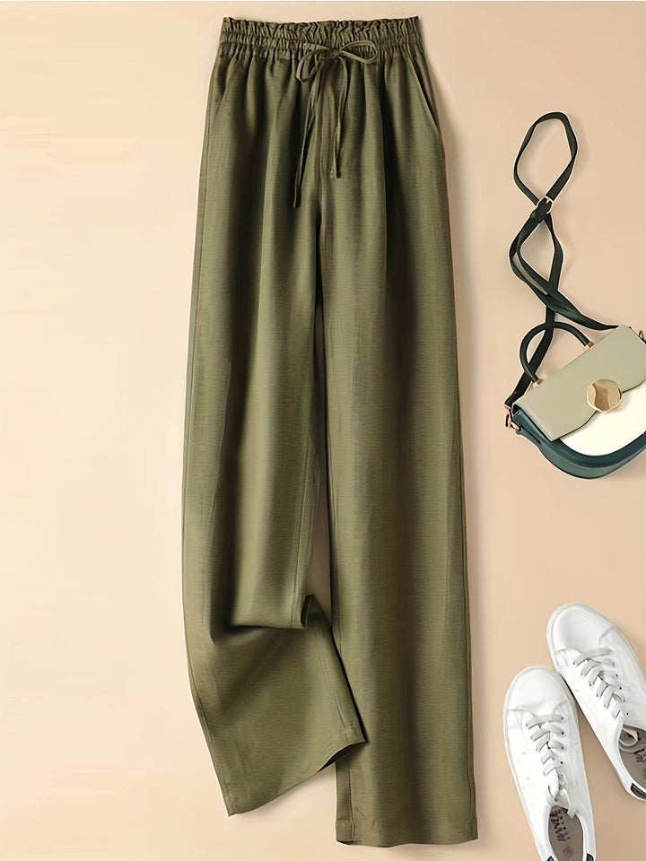 Pantaloni donna blu casual, vita alta con coulisse e tasche, perfetti per un look rilassato e chic.
