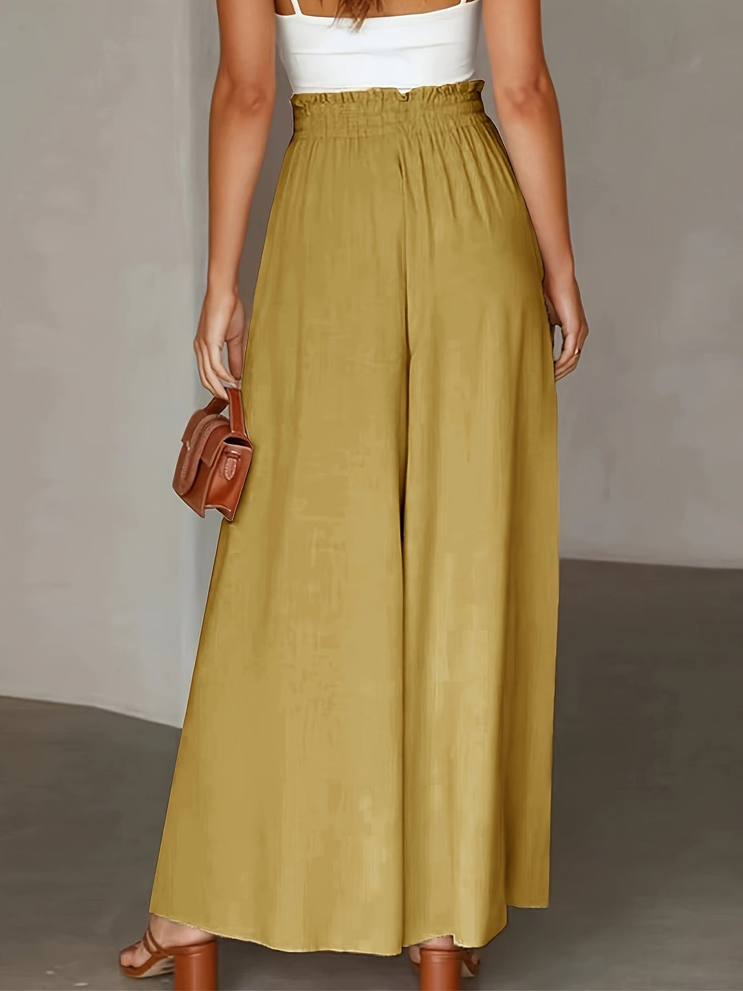 Pantaloni palazzo eleganti e versatili da donna, vita alta, adatti a tutte le stagioni.