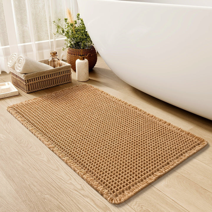 Tappetino bagno ultra assorbente grigio con design a nido d'ape, perfetto per doccia e comfort.