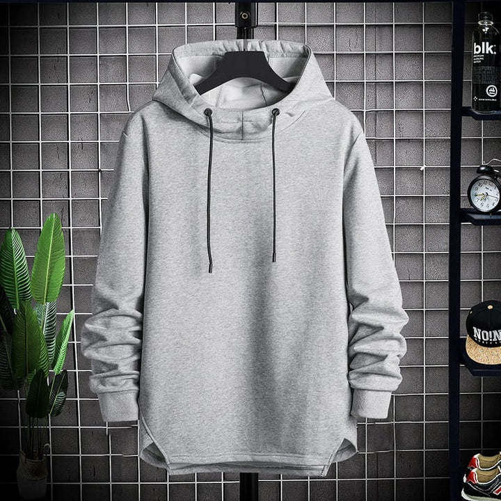 Felpa uomo con cappuccio e spalla scesa, un capo casual moderno con pratica tasca a marsupio per look rilassati.