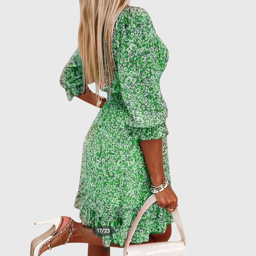 Midi vestito estivo donna con stampa floreale, maniche a sbuffo, comodo e fresco per l'estate.