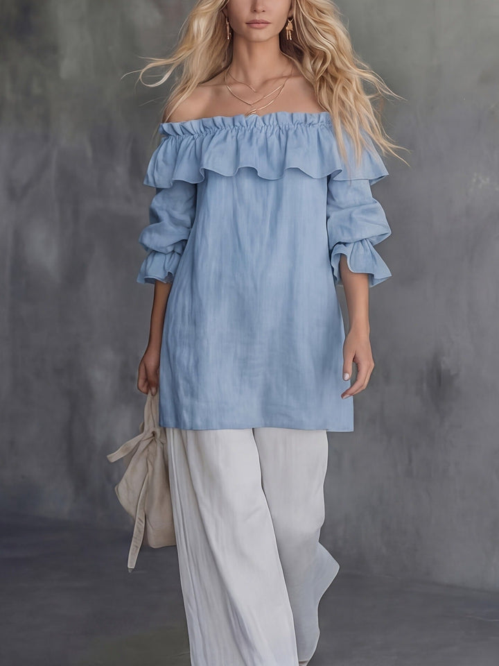 Blusa estiva monospalla con volant e maniche a sbuffo, un capo d'abbigliamento donna fresco, chic e alla moda.