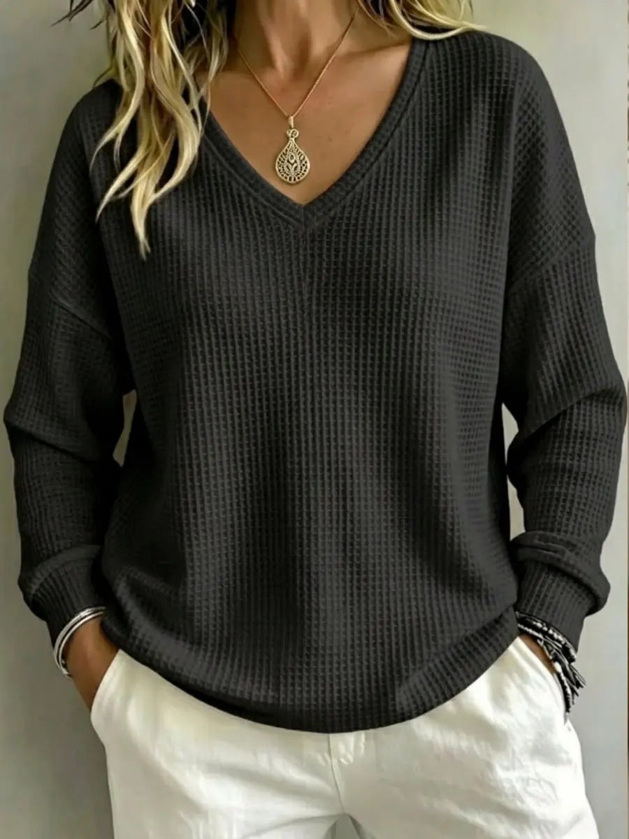 Pullover casual donna con scollo a V, ideale per uno stile comodo e un abbigliamento quotidiano.