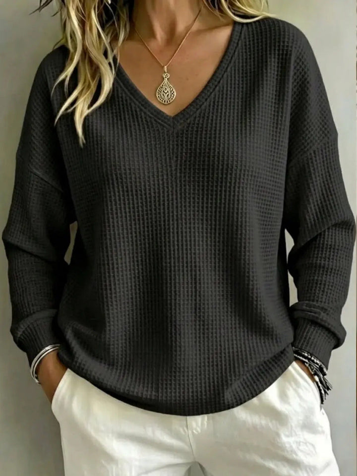 Pullover casual donna con scollo a V, ideale per uno stile comodo e un abbigliamento quotidiano.