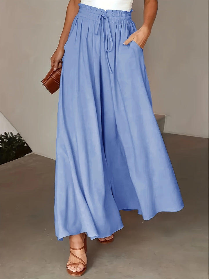 Eleganti pantaloni a gamba larga da donna, vita alta, ideali per outfit casual o estivi.
