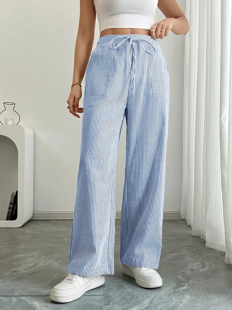 Comodi pantaloni estivi donna a righe, vestibilità ampia, ideali per il relax o la città.