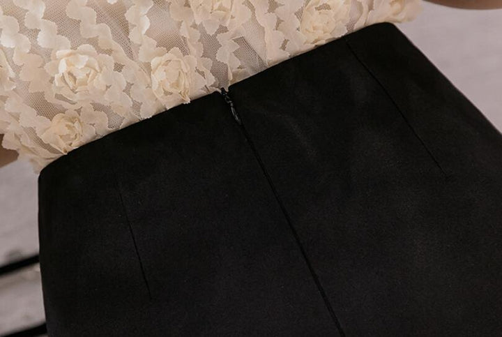 Gonna corta nera da donna, modello A-line fasciato con spacco. Ideale per primavera, look elegante e moderno.