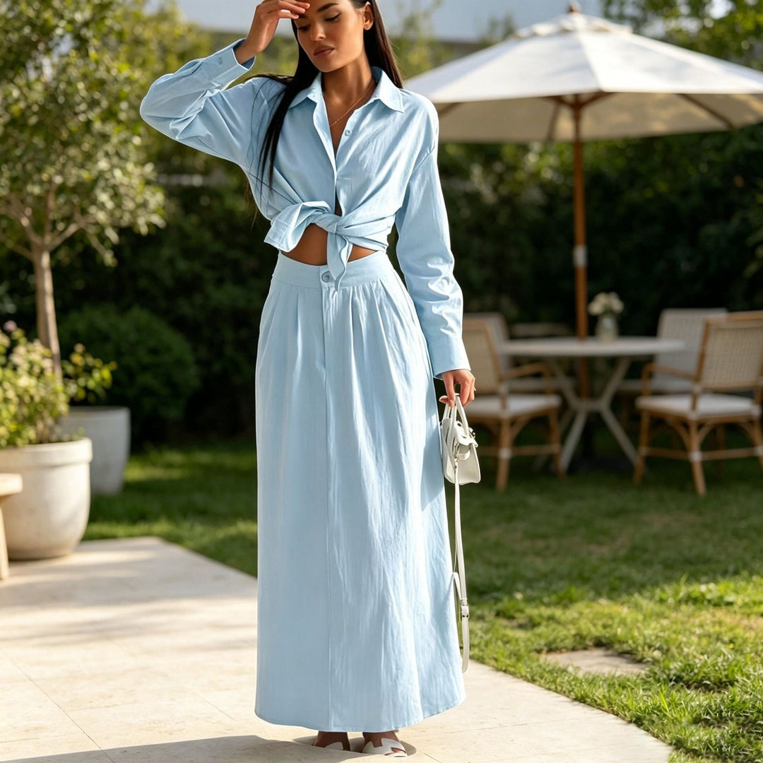 Moda femminile: set donna elegante blu chiaro con blusa e gonna lunga, ideale per eventi o look raffinato.