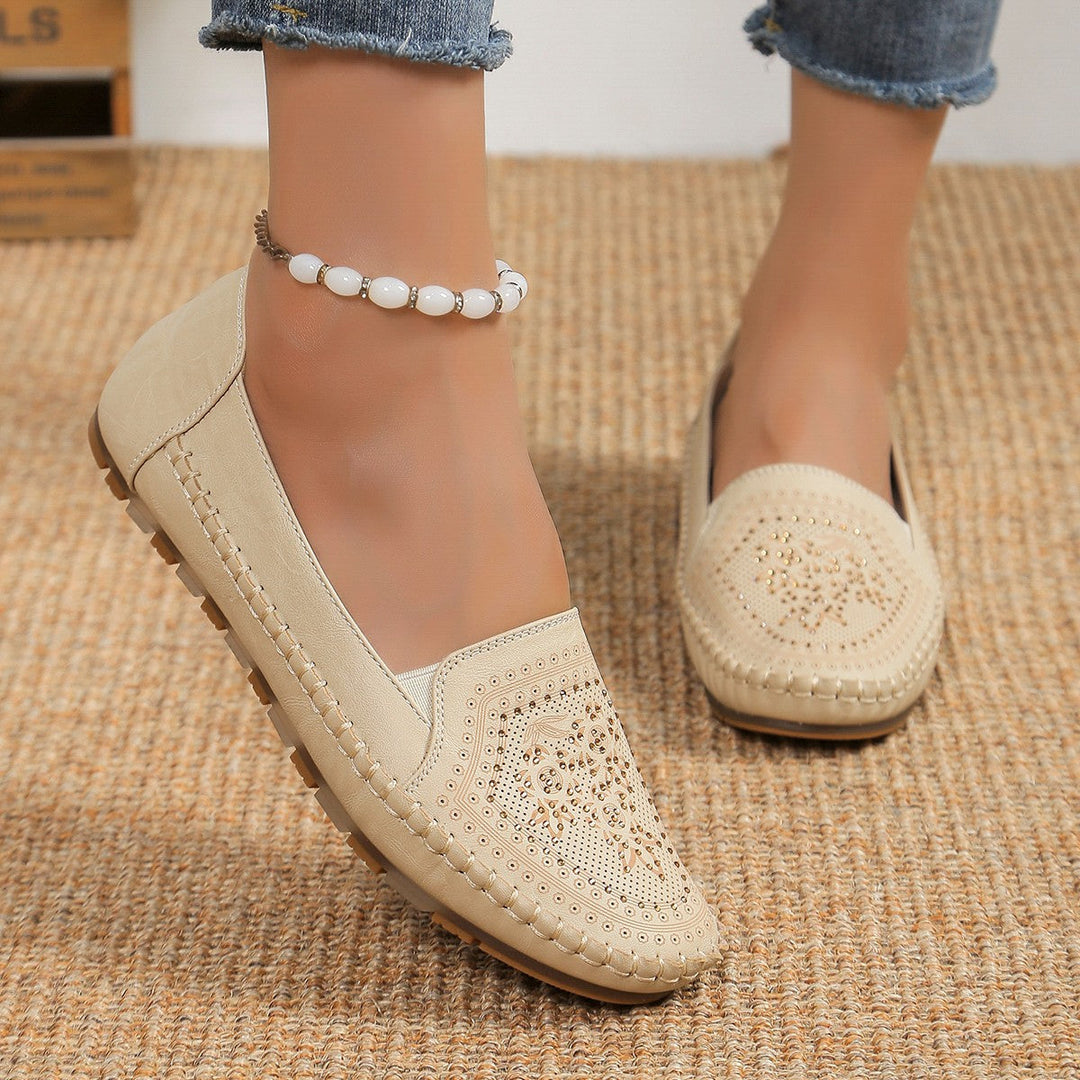 Eleganti stivaletti donna in pelle con dettagli di cucitura a mano, perfetti per look casual chic tutto l'anno.