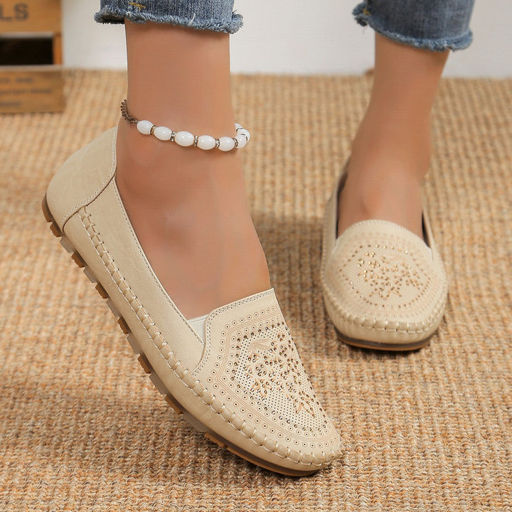 Eleganti stivaletti donna in pelle con dettagli di cucitura a mano, perfetti per look casual chic tutto l'anno.