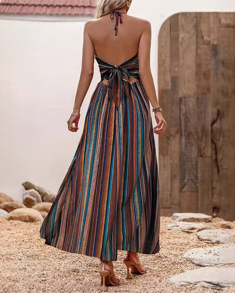Midi dress donna estivo, stampa vivace e multicolore, spalline sottili, tendenza moda per look freschi.