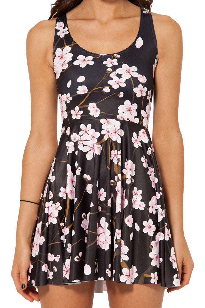 Abito estivo midi donna con stampa pois, spalline sottili, gonna a balze, per un look fresco.