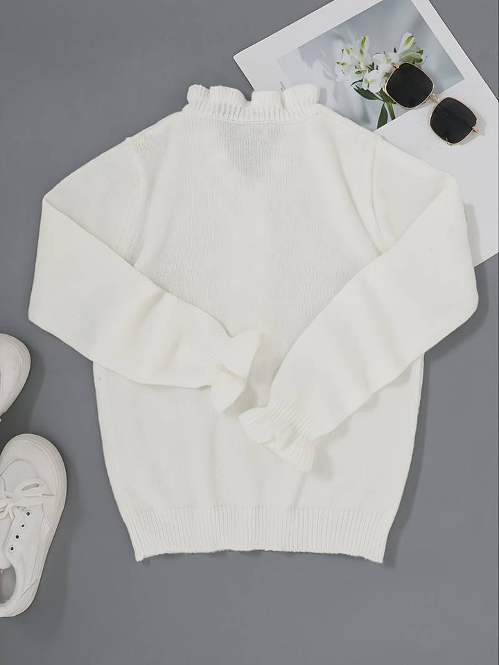 Moda femminile: maglione bianco con scollo a V, ideale per comfort quotidiano e look casual chic.