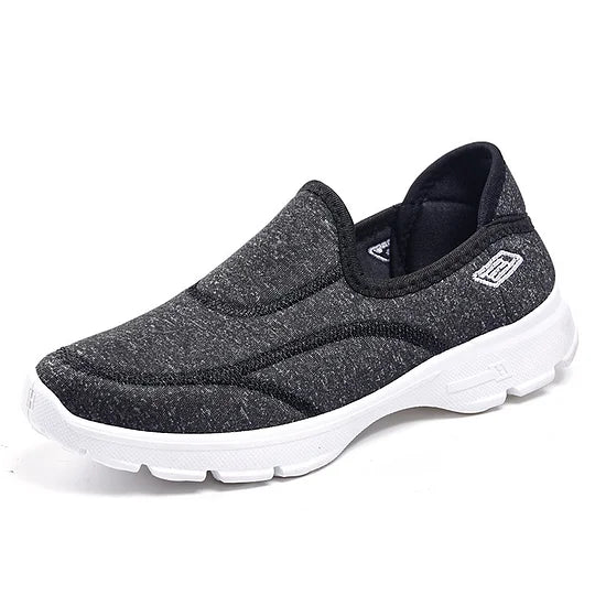 Scarpe slip-on donna comode e sportive con supporto e cuscino d'aria, perfette per lunghe camminate e attività quotidiane.