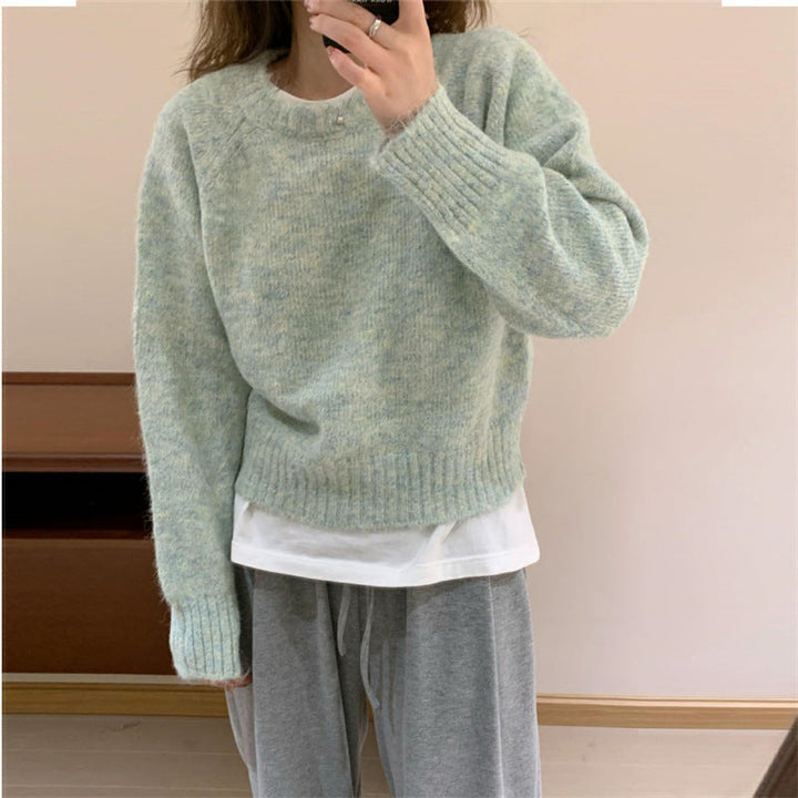 Maglione pullover donna comodo con scollo rotondo e vestibilità ampia per look casual e di moda.