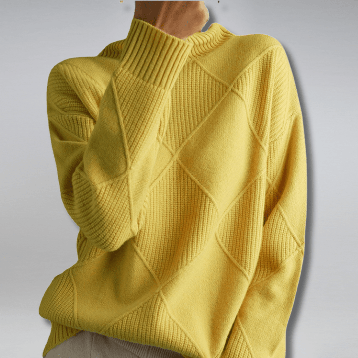 Pullover dolcevita donna, in maglia morbida e avvolgente, per un abbigliamento invernale che unisce comfort e stile.